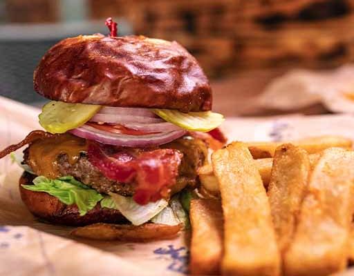 23 Restaurants Private Events Gallery | people eating food, playing various games and having fun